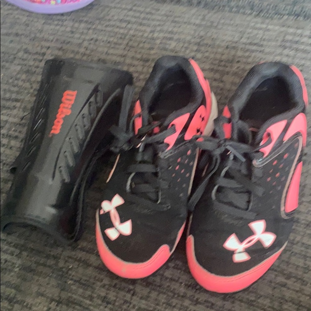 Soccer cleats size 11 and skin pads